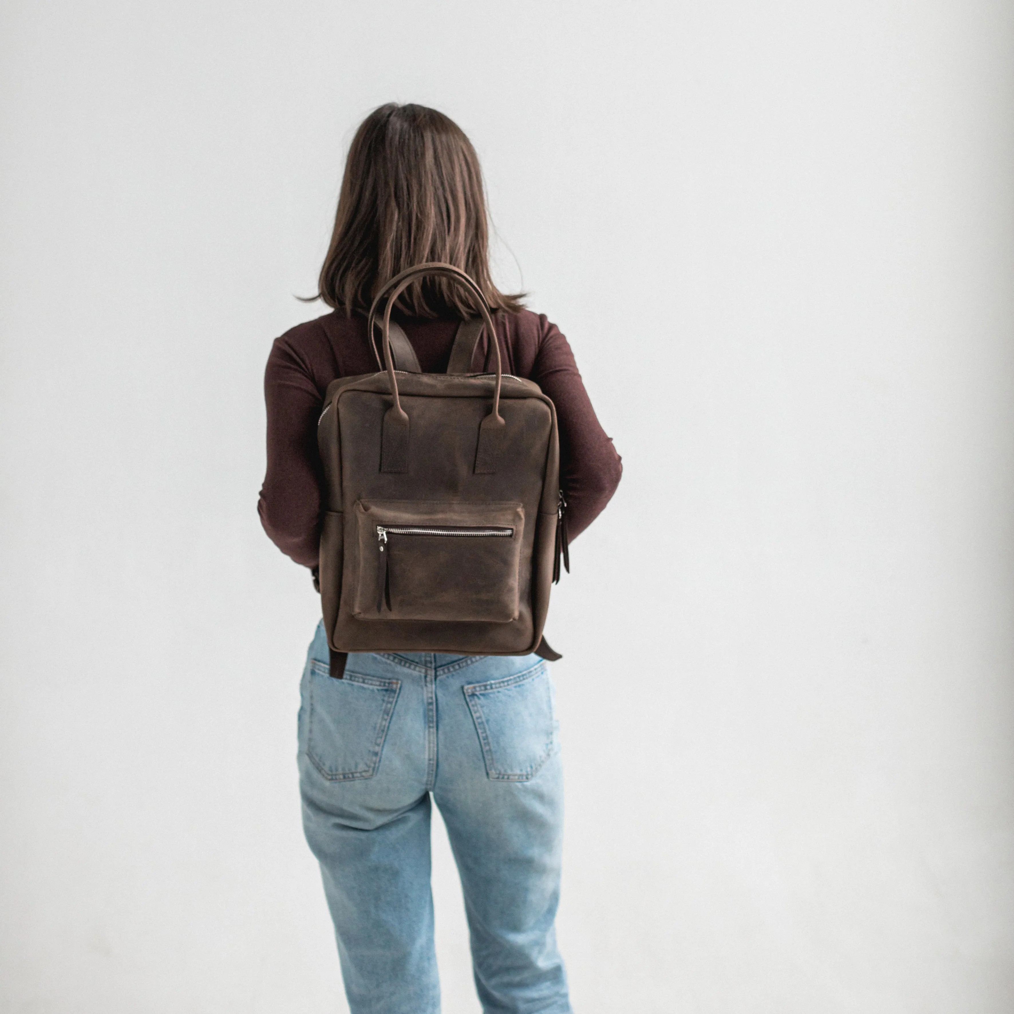 Dark brown leather city backpack