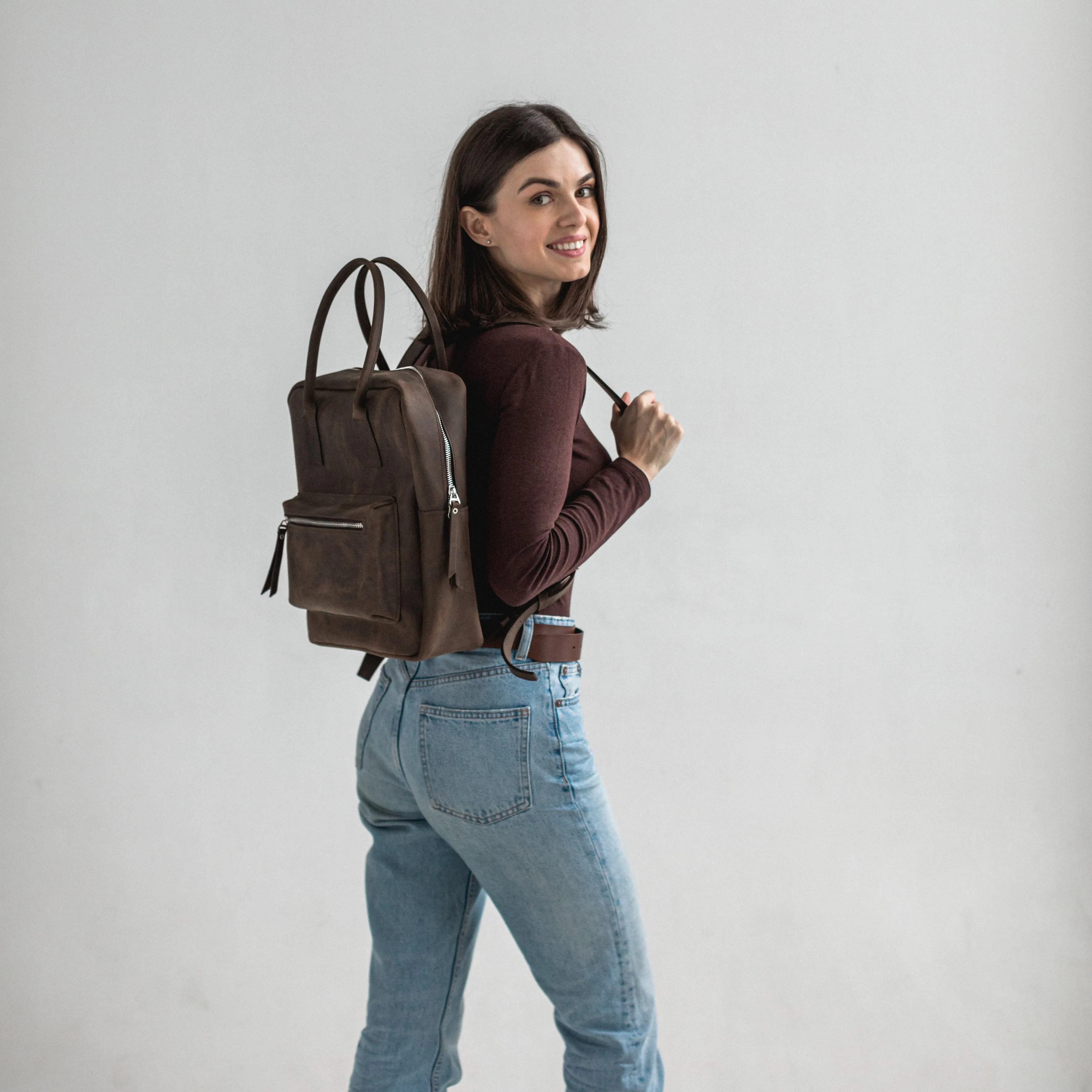 Dark brown leather city backpack